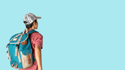 Young man t-shirt wearing and cap with backpacker isolated on blue background.