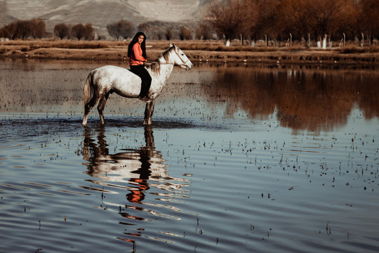 red women on the river