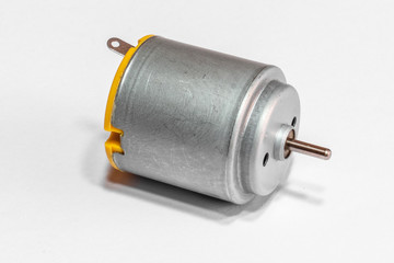 Small DC motor for DIY toys isolated on white background