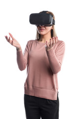 Young woman in virtual reality (VR) glasses. Isolated on white background