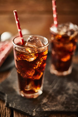 Close up glass of refreshing cola.