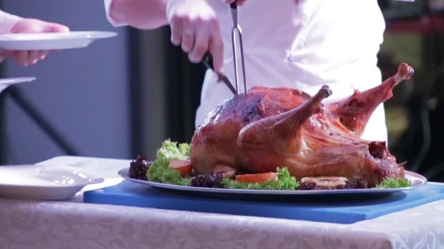 chef cut up roast turkey