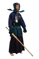 Portrait of man kendo fighter with shinai (bamboo sword). Shot in studio. Isolated with clipping...