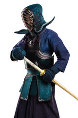 Portrait of man kendo fighter with shinai (bamboo sword). Shot in studio. Isolated with clipping...