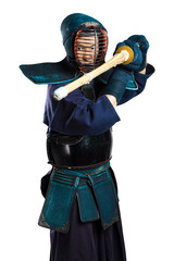 Portrait of man kendo fighter with shinai (bamboo sword). Shot in studio. Isolated with clipping...