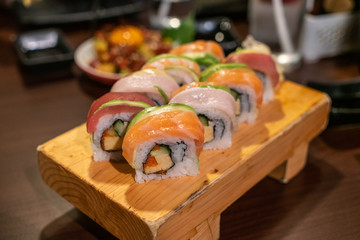 Fresh rainbow sushi roll with salmon and Tuna - Japanese food