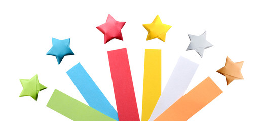 Variety of colorful paper origami star sheets isolated white