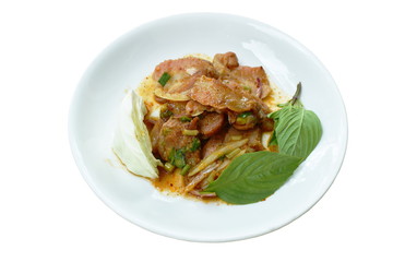 spicy roasted pork Thai salad eat with fresh cabbage and basil ltaf on plate