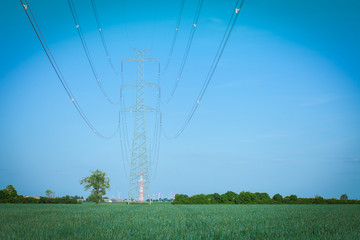 High voltage transmission line against clear blue sky