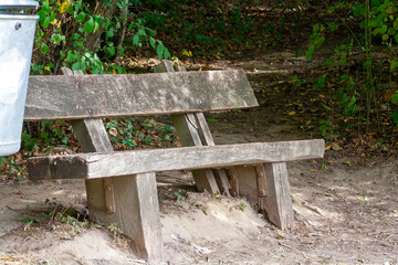 An old wood bench in the outdoor park.