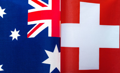fragments of the national flags of Australia and Switzerland close up