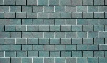 Simple teal brick pattern. Empty surface for backgrounds or backdrops.