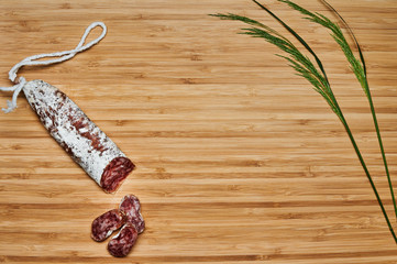 spanish sausage on a wooden table