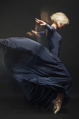 Girl ballerina posing and performing dance elements  © ivancheremisin