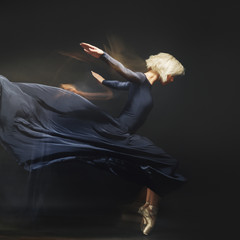 Girl ballerina posing and performing dance elements  © ivancheremisin