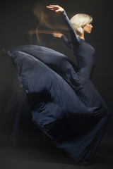 Girl ballerina posing and performing dance elements  © ivancheremisin