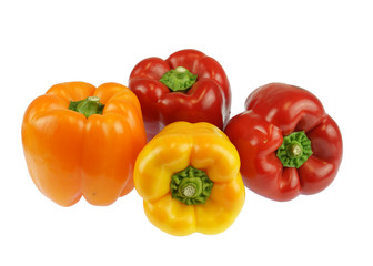 close up on fresh colorful peppers isolated on white background