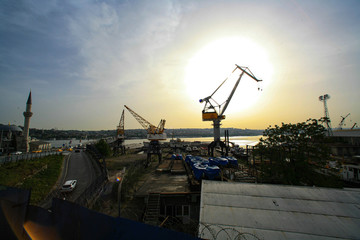 Ships and cranes in the shipyard. 