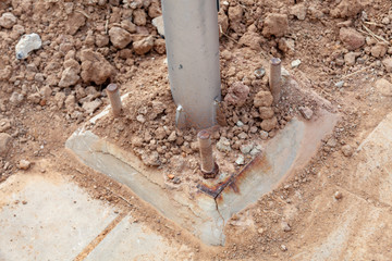 Lighting Pole Foundation and Crosswalk at the intersection of red lights near the mall.