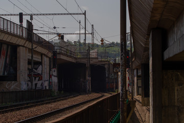 an old railway tunnel for trains in the Czech city and a bridge for trains next to it