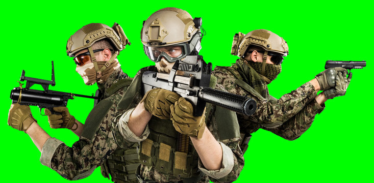 Male in uniform of Tactical Units of Police with submachine gun P90. Shot in studio. Isolated with clipping path on green chroma key background