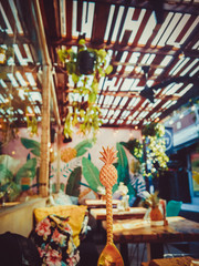 cafe in Bali palm trees green coffee mug Sunny day pillows pineapple