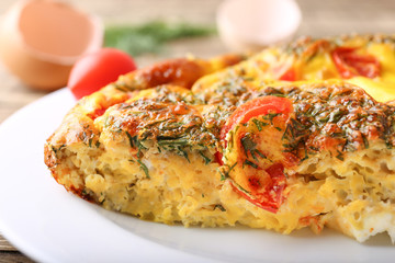 Omelet with vegetables close-up