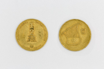 Modern Israeli coin half sheqel on the white background