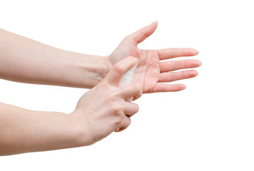 Woman is using spray sanitizer to desinfect her hands. Close up shot. Sude view.