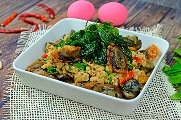 Spicy stir fried preserved eggs with crispy basil and minced pork.