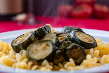 Italian food: pasta with zucchini and parmesan