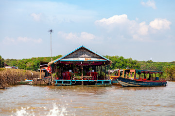 Tonle SAP, Cambodia - February 2014: Kampong Phluk village during drought season. Life and work of residents of Cambodian village on water, near Siem Reap, Cambodia