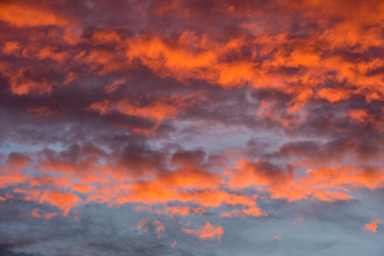 Sunset red sky with clouds horizontal background