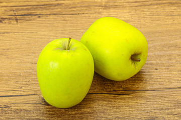 Two ripe green sweet apples
