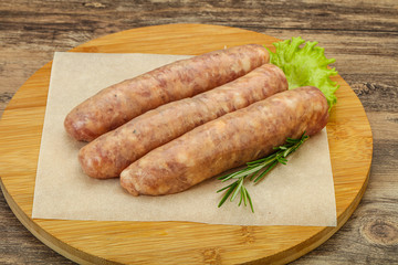 Raw pork meat sausages for grill