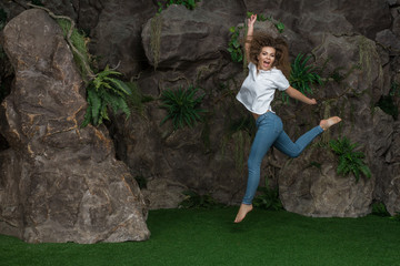 beautiful girl posing happily in the tropics