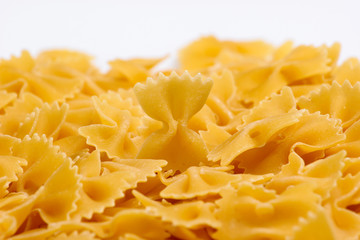 Italian pasta Farfalle. Pasta bows on white background