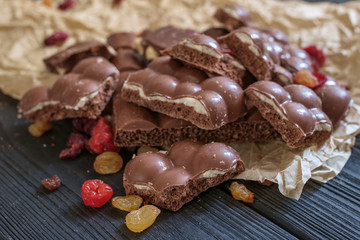 close up of milk chocolate  with sec fruits
