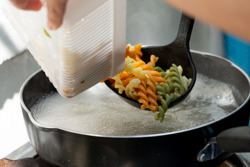 Vegetable rotini pasta soup with pork and carrot