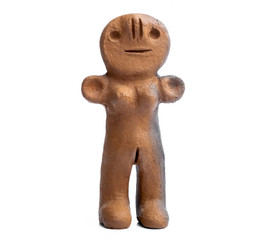 Ancient clay female figurine from Canary Islands isolated on white background