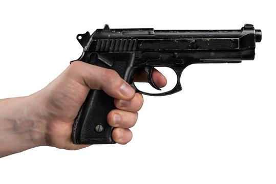 Handgun Beretta M9 in male hand isolated on white background. 