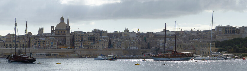 Fototapeta premium Panoramic view of the fortified city of Valletta and its harbours. Valletta, Malta.