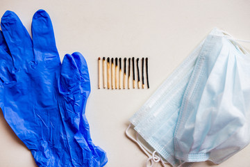burn out of matches, gloves and medical mask