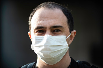 Portrait of a man in a mask during the 2020 COVID-19 corona virus outbreak