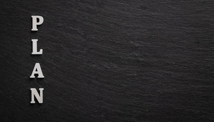 Plan - text on blackboard background