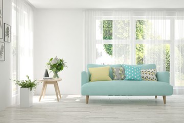 White living room with sofa and summer landscape in window. Scandinavian interior design. 3D illustration