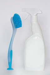 brush and empty detergent bottle, isolate on white background, concept