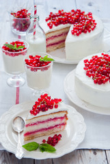 Cakes with red currant decorated with fresh red berries