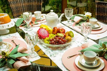 Table with fruits and cake breakfast