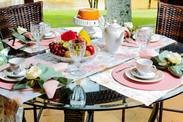 Table with fruits and cake breakfast